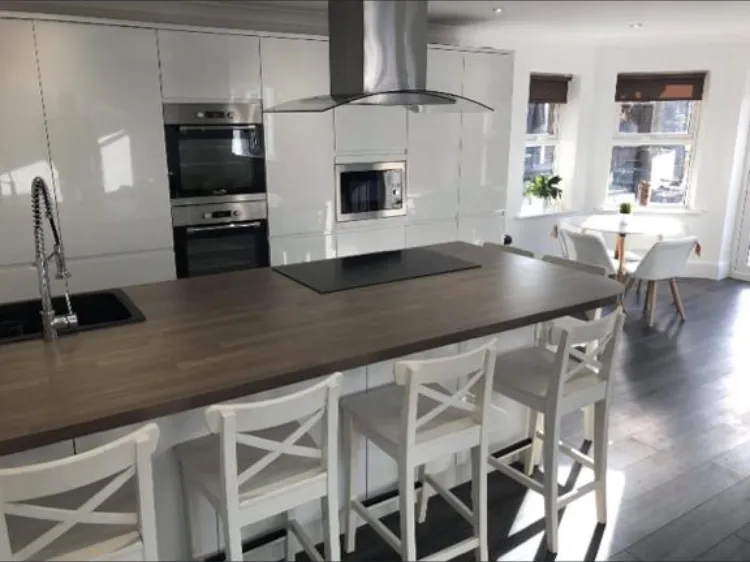 kitchen with hooded worktop